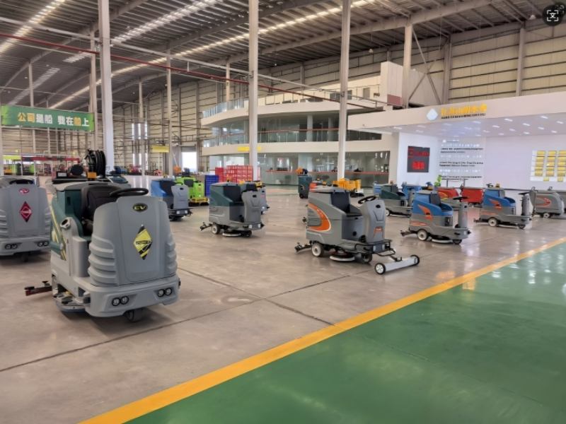 Commercial ride on floor scrubber machine